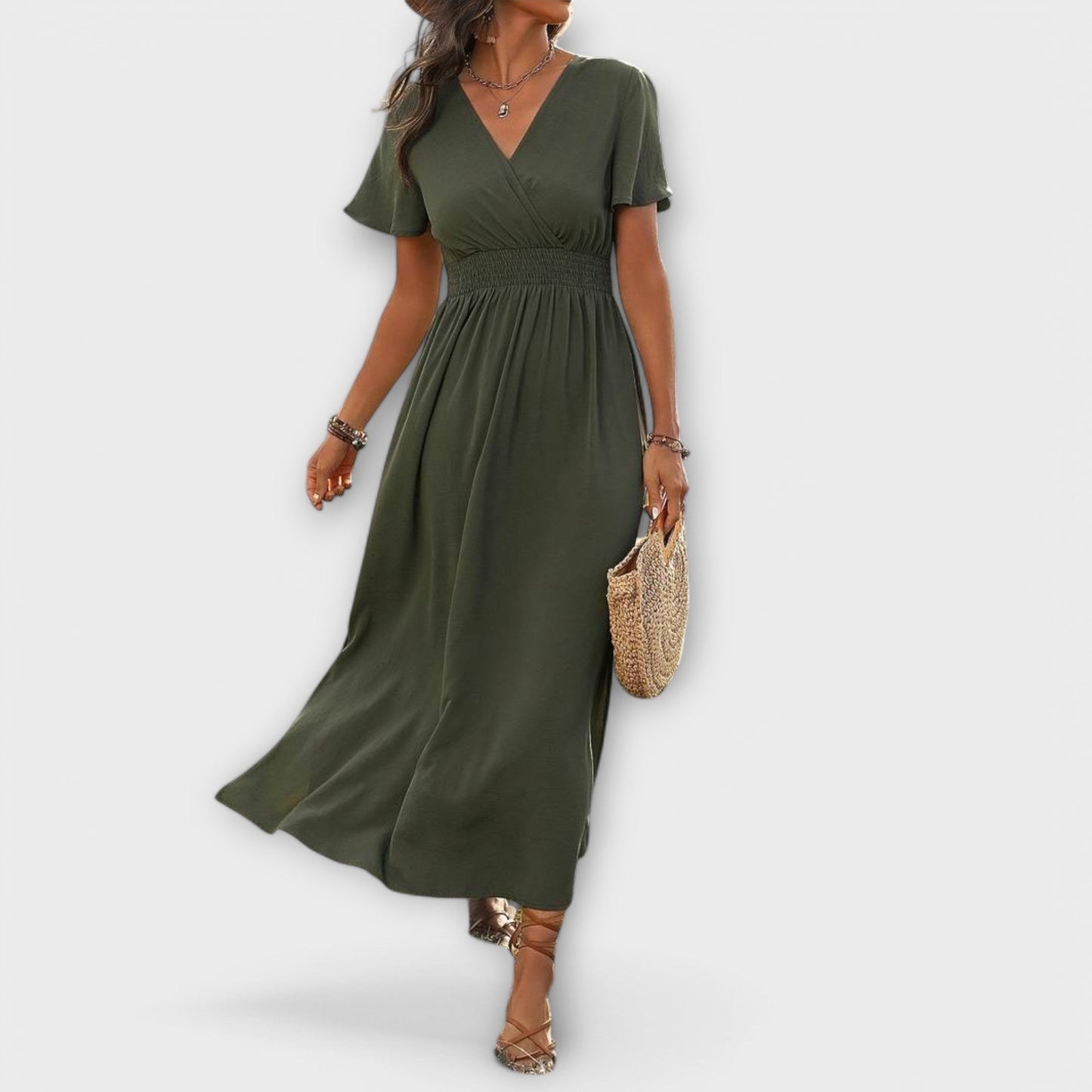 An elegant Boho dress with a V-neckline and long sleeves