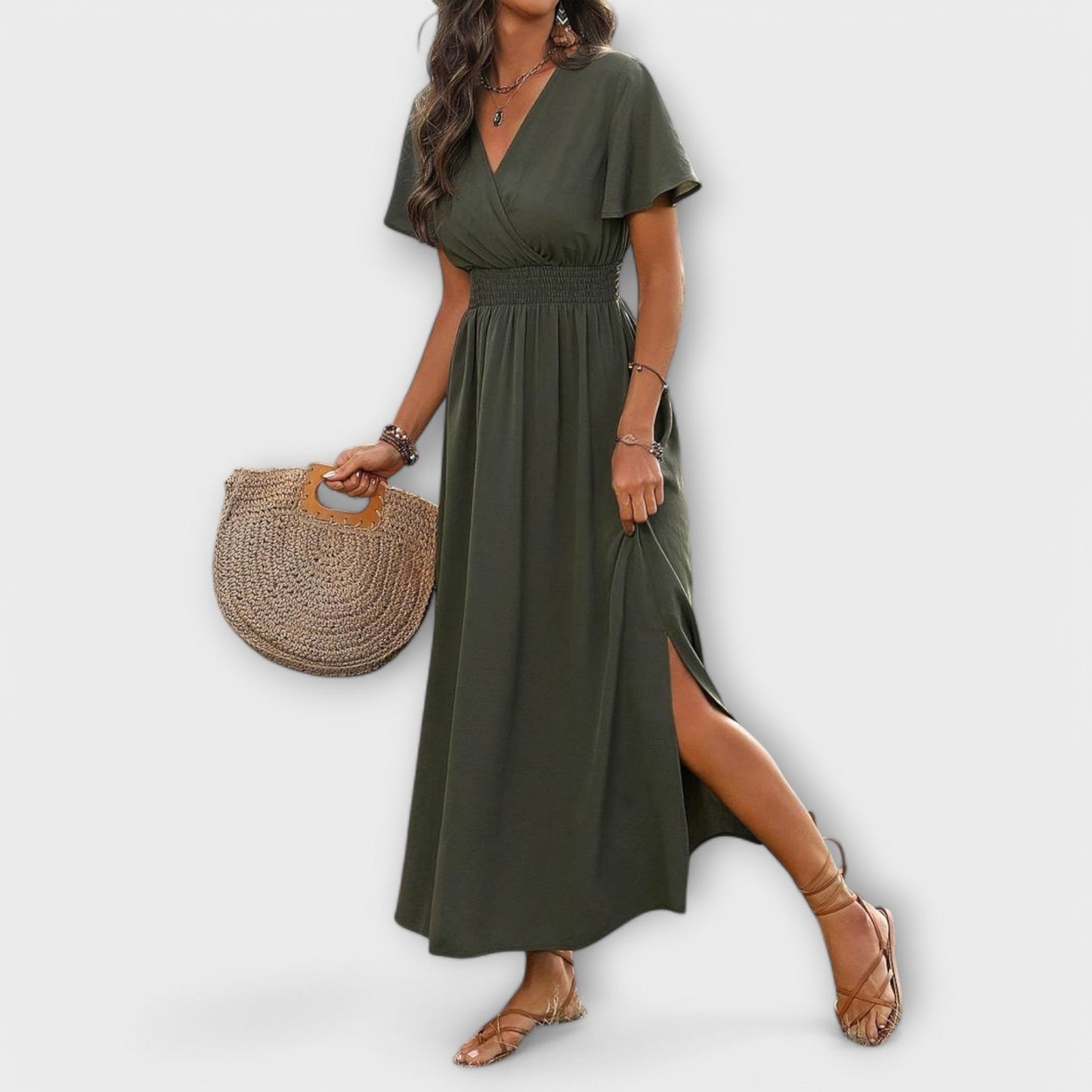 An elegant Boho dress with a V-neckline and long sleeves