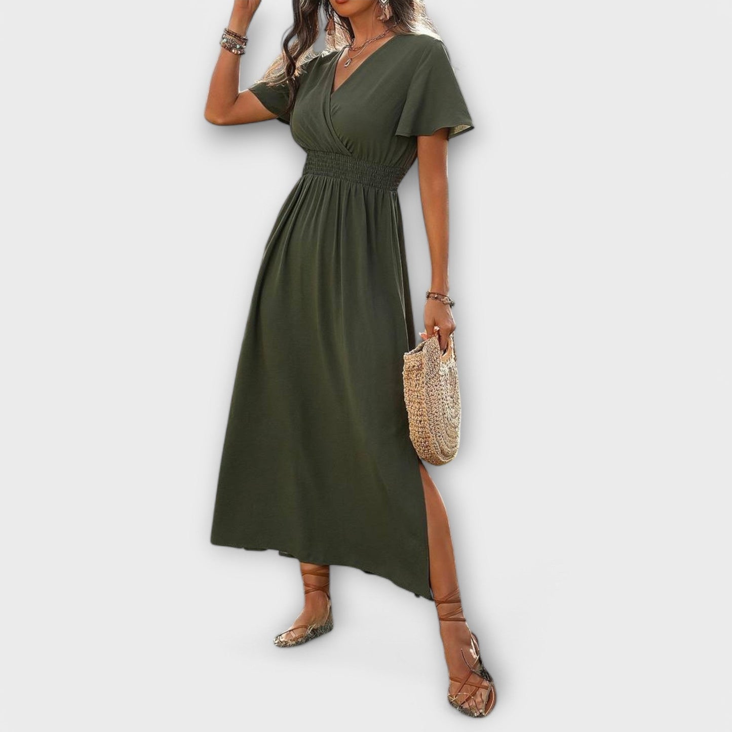 An elegant Boho dress with a V-neckline and long sleeves