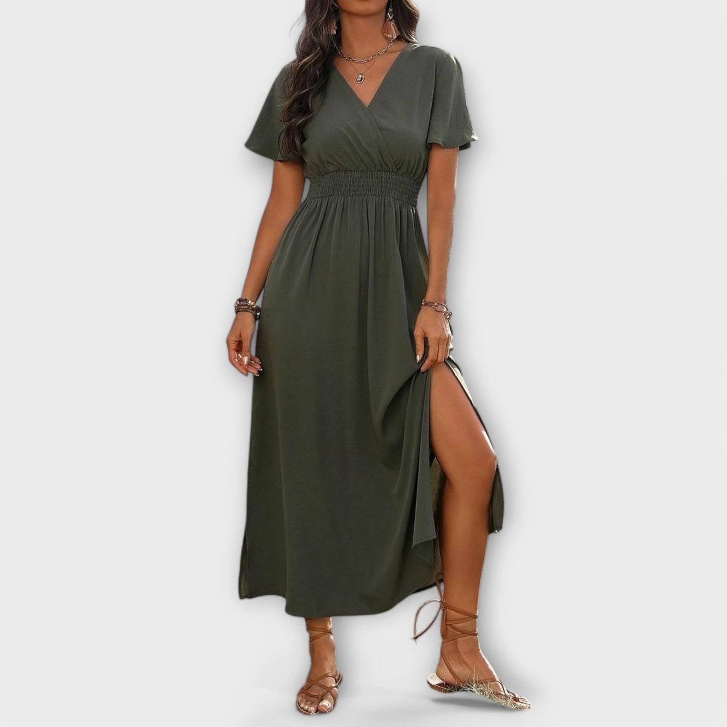An elegant Boho dress with a V-neckline and long sleeves